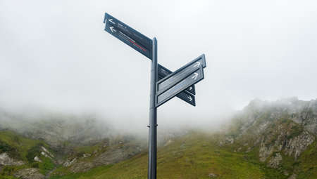 Index of hiking trails for tourists in the mountains, indicating the length of the route and its difficulty, Krasnaya Polyana, Sochi, Russia.の写真素材