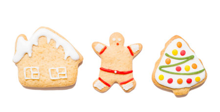 Christmas cookies of various shapes on isolated white background.