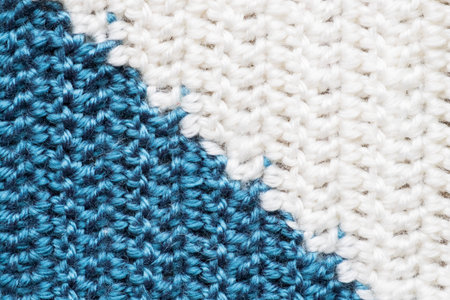 Handmade close-up simple blue and white crochet pattern