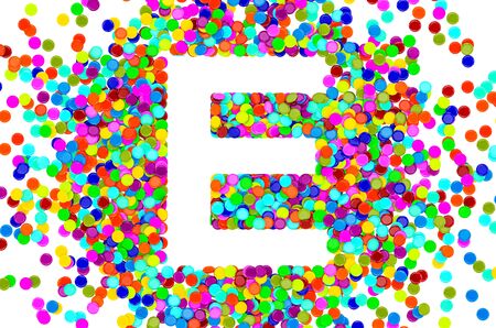 Confetti font, letter E from colored confetti. 3D rendering isolated on white backgroundの写真素材