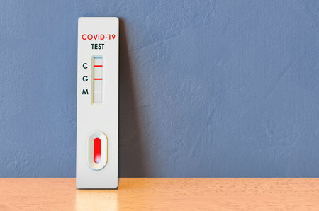 Positive Tests COVID-19 coronavirus, rapid test cassette on the wooden table. 3D rendering