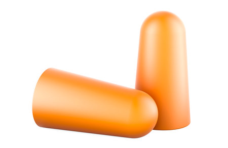 Orange Disposable Earplugs. Pair of Soft PU Foam Bullet Earplugs. 3D rendering isolated on white backgroundの写真素材