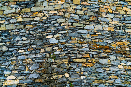 Old Dry Stone Wall with Irregular Slate Textureの写真素材