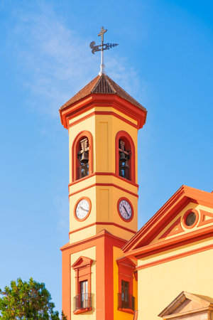Clock tower of Parroquia de San Jose Obrero in Malaga, Spainの写真素材