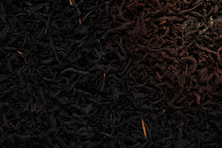 Blackened tea leaves close up.