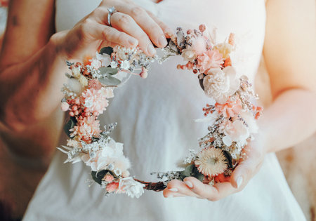Bride holding a flower crownの写真素材