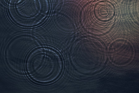 Water ripple texture, blue backgroundの写真素材