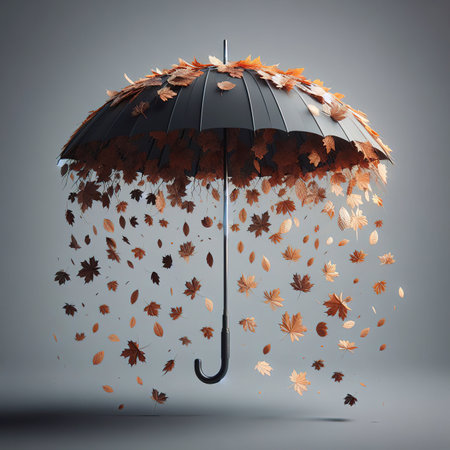 black umbrella with dry leaves falling from inside on grey backgroundの素材