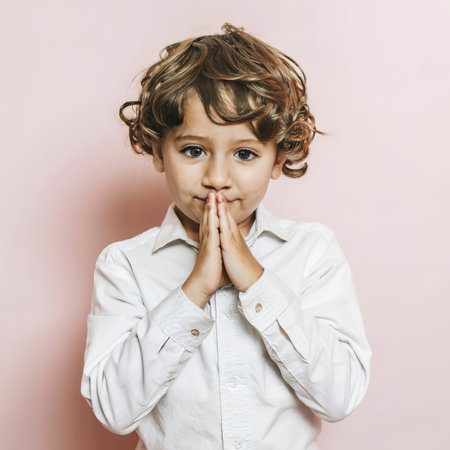 Smiling kids cute adorable sweet child boys on pink backgroundの素材