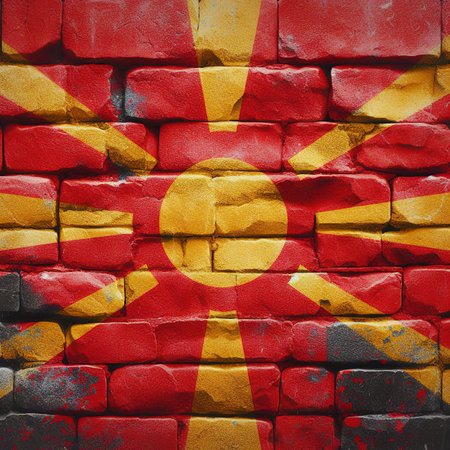 North Macedonia flag overlay on old granite brick and cement wall texture for background useの素材