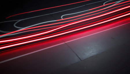 A light trail of neon red and silverの素材