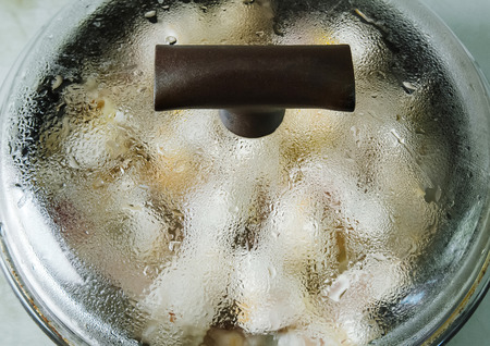 pan covered with a glass lidの写真素材