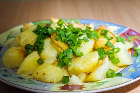 potatoes with meat and green onionsの写真素材