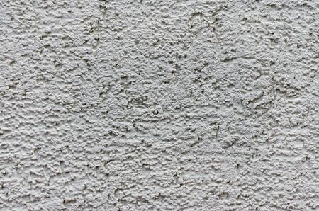 Multicolored natural marble chip plaster close-up backgroundの写真素材