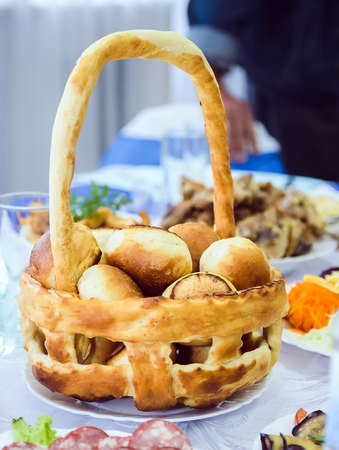 baked buns in a basketの写真素材