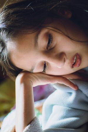 portrait of a beautiful teen girl on the street close upの写真素材