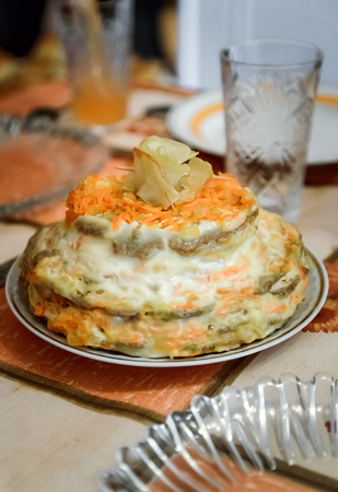 Cake from liver pancakes and vegetables.の写真素材