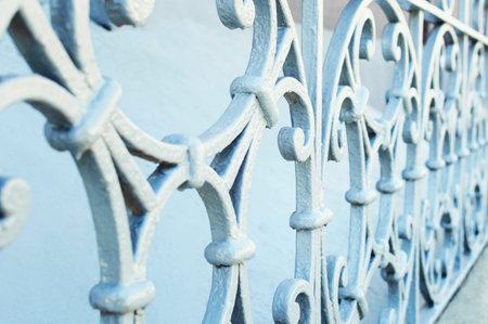 Beautiful Light gray metal fence. Close-up, selective focus.の写真素材