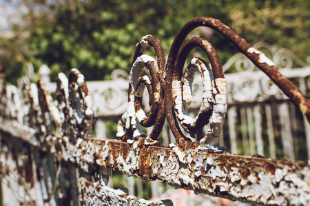 Elements of a very old vintage metal fence, Closeup, selective focus.の写真素材