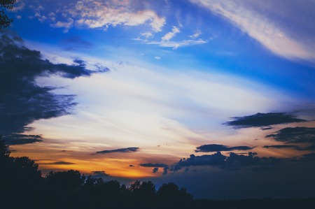 The majestic beautiful blue sky of sunset. Pre-threatening mood. Cloudy abstract background.の写真素材