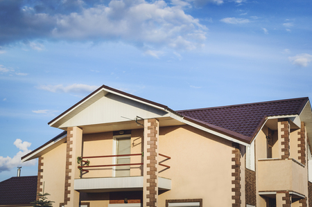 A beautiful country house beige in a modern style, a design of a country house.の写真素材