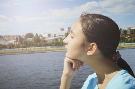 Lifestyle portrait of a teenage girl. Summer, vacation, holiday.の写真素材