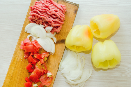 Raw minced meat and fresh vegetables. Ingredients for home cooking.の写真素材
