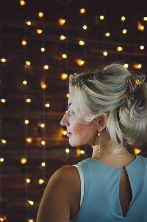 Beautiful woman with blond hair, profile.