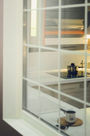 Beautiful interior, view of the kitchen through the window.の写真素材
