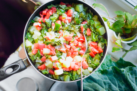 Preparation of dishes from fresh vegetables. Healthy food. Closeup, selective focus.の写真素材