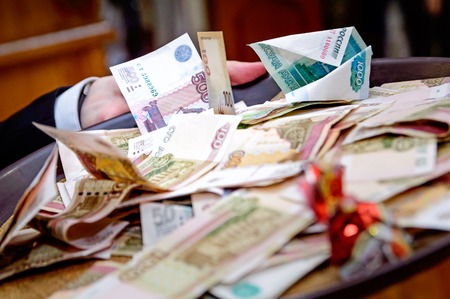 Russian money of various denominations lie on the table mixed.の写真素材