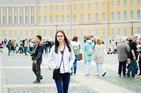 Saint Petersburg, RUSSIA - July 08, 2018: Tourists walk along the Palace Square of St. Petersburg.のeditorial素材