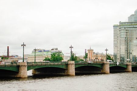 Saint Petersburg, RUSSIA - July 08, 2018: Beautiful romantic view of the city and the river in St. Petersburg. Stylish bridge over the canal.のeditorial素材