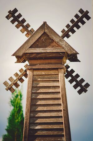 Decorative wooden weather vane. Decoration of a country house.の写真素材