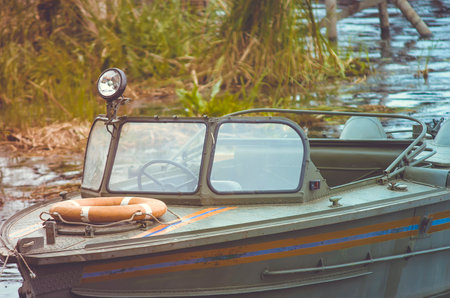 old motorboat at a jetty.の写真素材