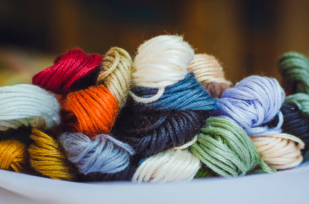 Multicolor threads for embroidery cross-stitch, mulina. Close-up, selective focus.の写真素材