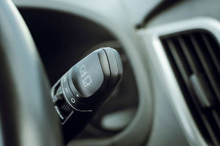 Control lever on the car steering wheel. Close-up, selective focus.の写真素材