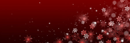 Beautiful snowflakes and bokeh on a dark red background. Wide Christmas background for design and web use.の写真素材