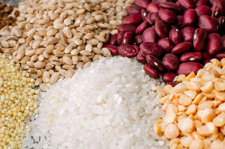 Various cereals: rice, beans, peas, barley. Healthy vegetarian food, vegetable protein, plant based diet concept.の写真素材