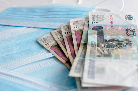 Price gouging during shortage of virus masks. High price of masks and demand during quarantine in...