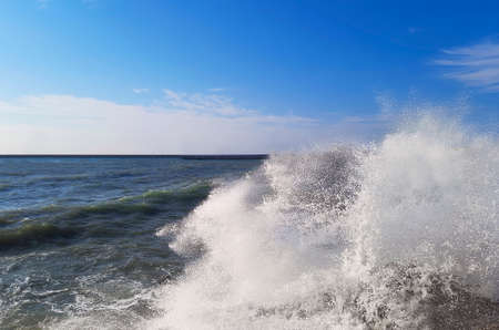Stormy sea waves break on the shore. beautiful seascape.の写真素材