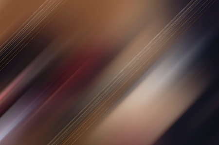 Dark abstract background with diagonal stripes and golden streaks.