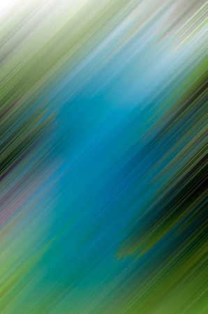 Abstract vertical background with blurred diagonal lines, blue-green color.の写真素材