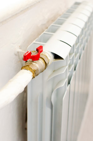 Heating Radiator, White radiator in an apartmentの写真素材
