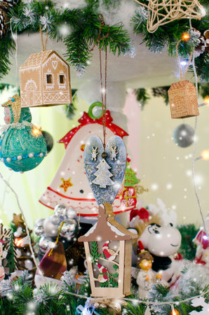 Christmas holiday background, Merry Christmas poster design small snow Christmas trees with decorations and garland. Vertical photography.Vertical photography.の写真素材