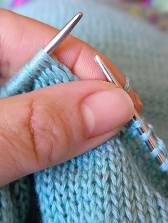 young woman knitting. Close-up, selective focus.の写真素材