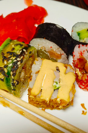Sushi set: sushi roll with salmon and sushi roll with smoked eel, selective focus.の写真素材