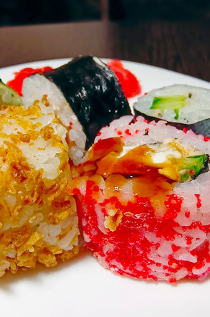 sushi with salmon and avocado. Close-up, selective focus.の写真素材