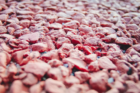 closeup of brown gravel pavement. expanded clay coating for paths and sidewalks.の写真素材