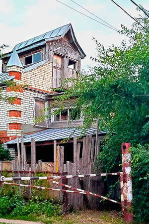 Abandoned old brick house. Vertical photo.の写真素材